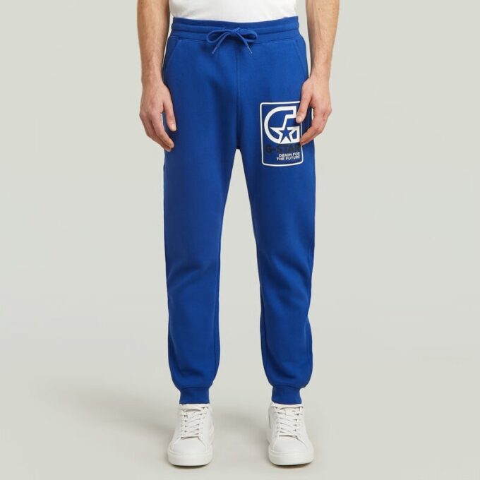 Multi Logo Graphic Sweat Pants Multi Logo Graphic Sweat Pants