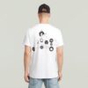 Trims Back Graphic T-Shirt Trims Back Graphic T-Shirt